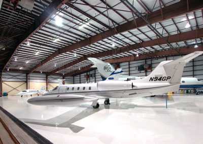 Picture of airplanes in the Galaxy Aviation prefab metal building warehouse with corrugated metal roofing built by McKee GC.