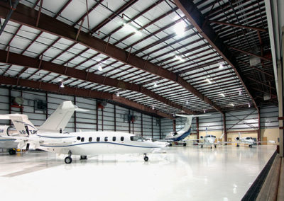 Picture of airplanes in a prefab metal building by McKee General Contractors.
