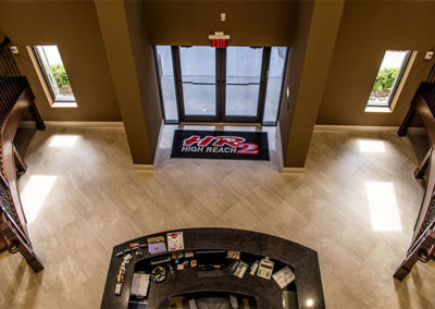 Front desk and lobby picture of High Reach commercial construction project by McKee.